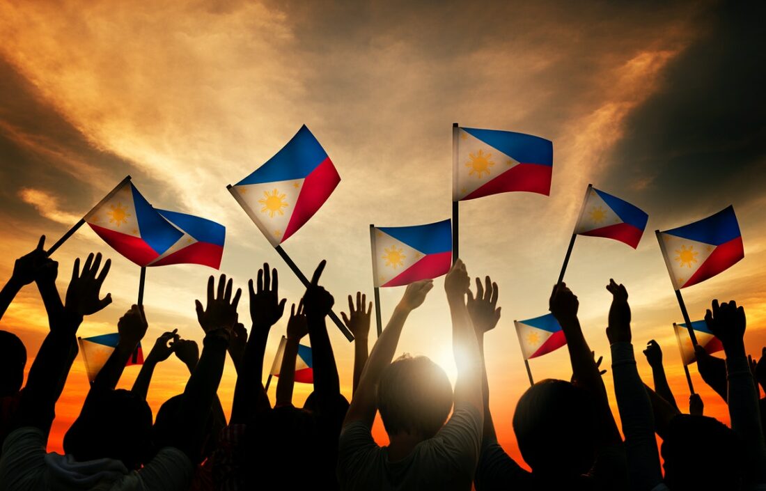 Kids waiving Philippine flag